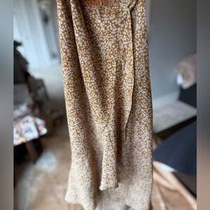 Very pretty faux wrap style skirt.